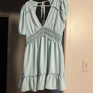 Dress from Rue 21, never worn, Size Medium but can fit a large as well.